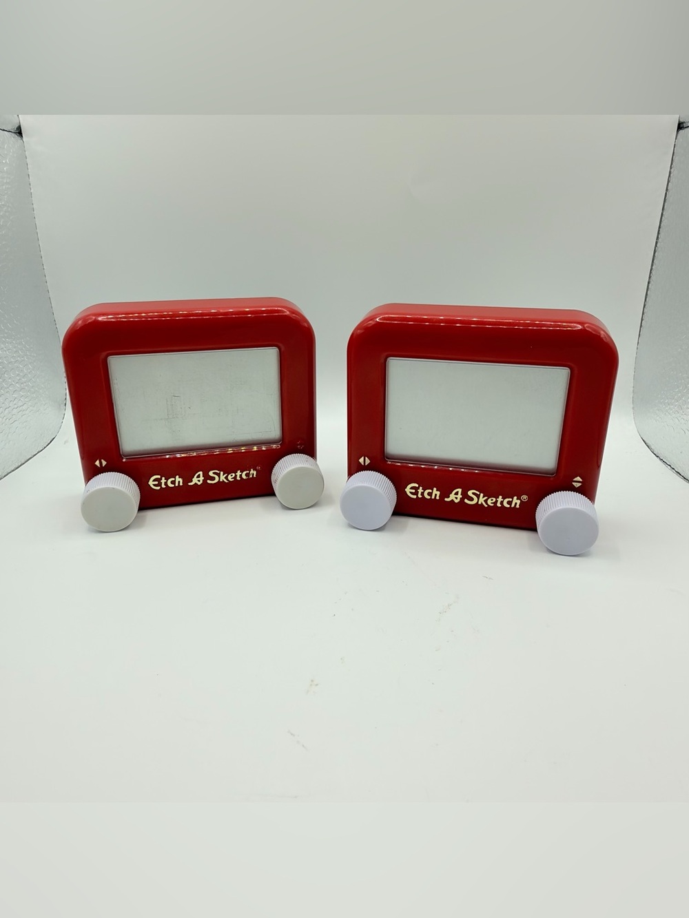 Pair of Mini Classic Red etch a Sketch toys